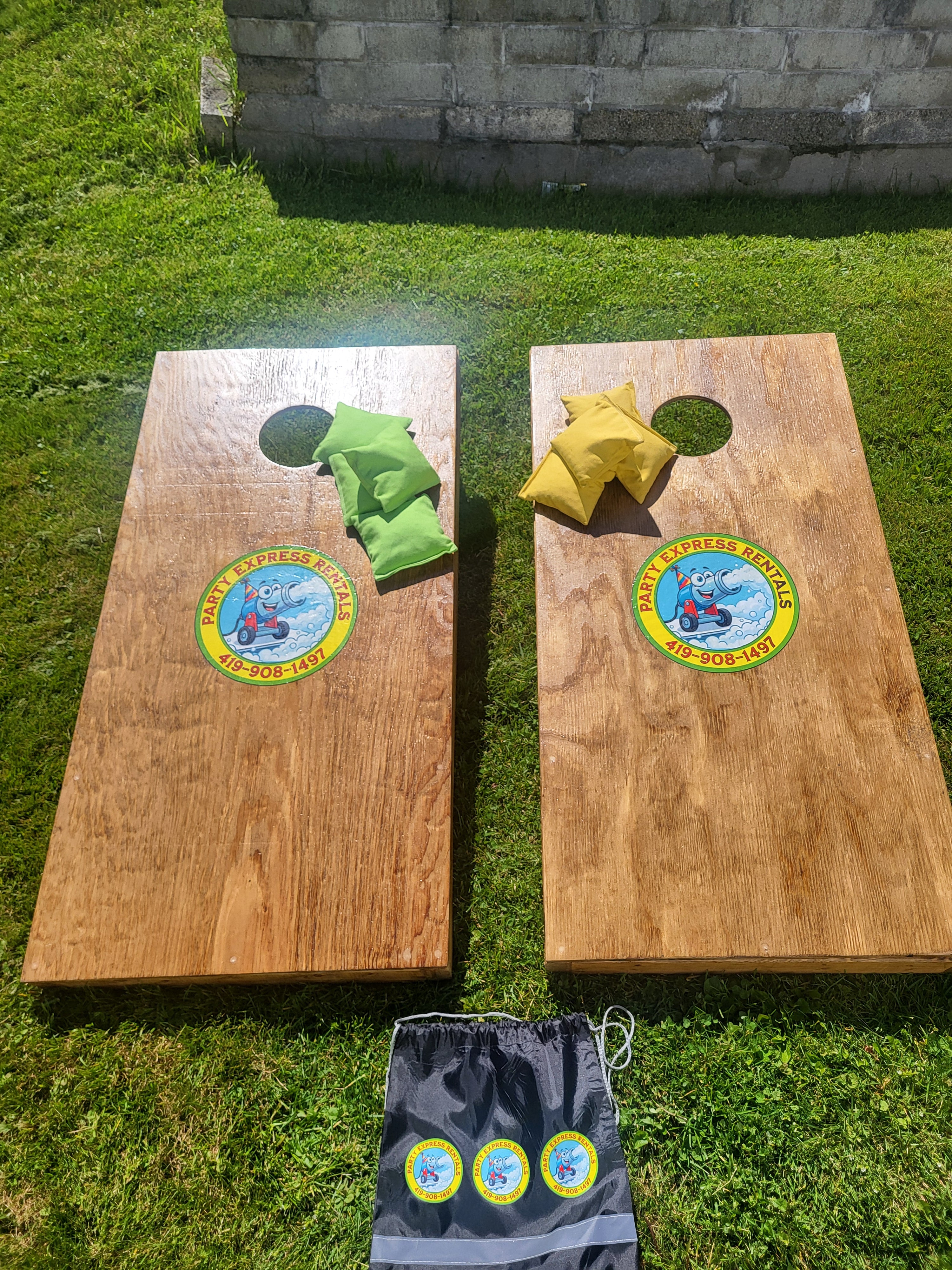 Cornhole Boards with Green and Yellow Bags